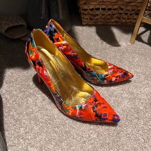 CHRISTIAN LOUBOUTIN
Hot Chick Patent Leather Pump Red Bottoms